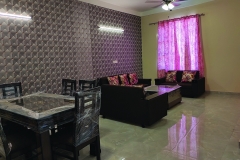 Living Room with Stylish Sofa & Dining Table – Home Brothers Interiors