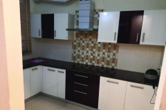 Elegant Modular Kitchen with Chimney – Home Brothers Homes
