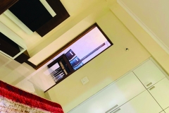 Spacious Bedroom with LED Panel & View of Dining Area – Home Brothers Interiors