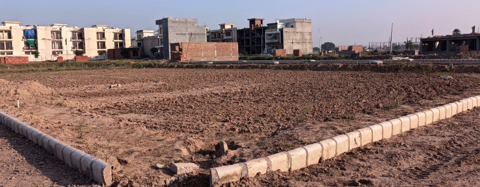 Residential Plot & Land View – Home Brothers Project, Kharar Residential land with paved internal road at Home Brothers project in Kharar